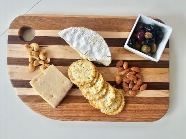 charcuterie board with cheese, crackers